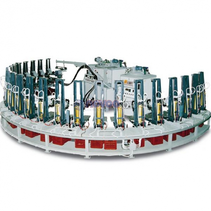 Ama Gusberti Banana 24-VR. Máquina semicircular manual de 24 estaciones, con configuración simple o doble y porta moldes verticales.